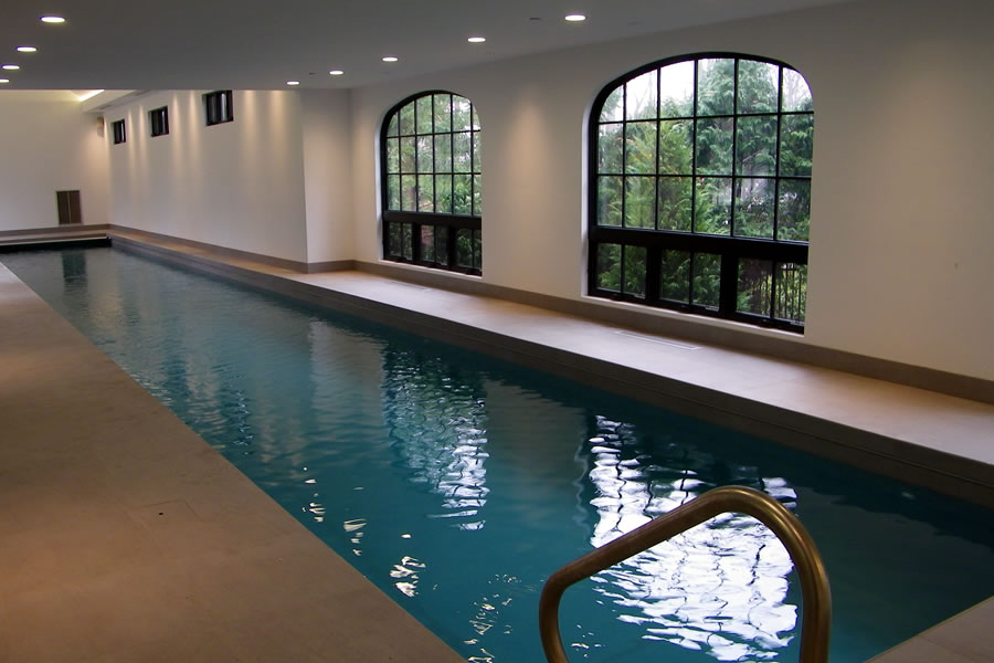  Indoor Lap Pool and Spa with Pool Cover Residential Pool Design by Omega Pool Structures, Inc