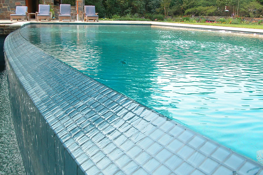 Vanishing Edge Outdoor Pool Brick, New Jersey Residential Pool Design by Omega Pool Structures, Inc